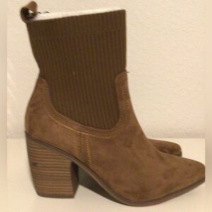 Sale 15.       New with tags brown heeled boots. Retails $50!